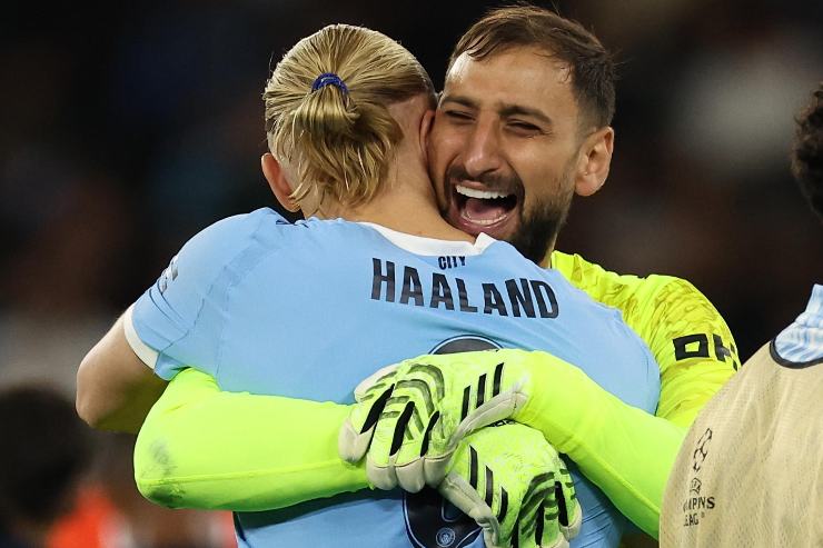 Gianluigi Donnarumma e Erling Haaland