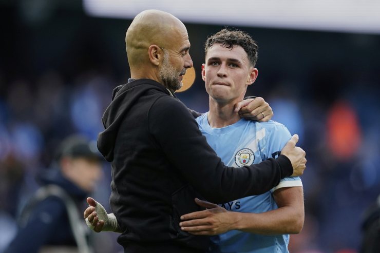 Pep Guardiola e Phil Foden